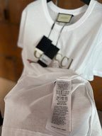 Λευκό βαμβακερό T-shirt με εφέ πλυσίματος